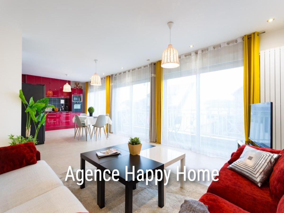 Salon après home staging, ambiance contemporaine avec touches rouges